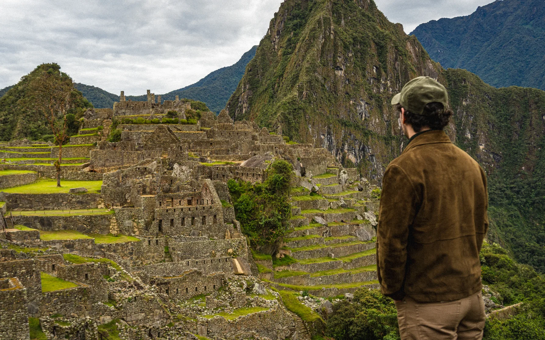 Javi looking over the terraces and mountains of Machu Picchu